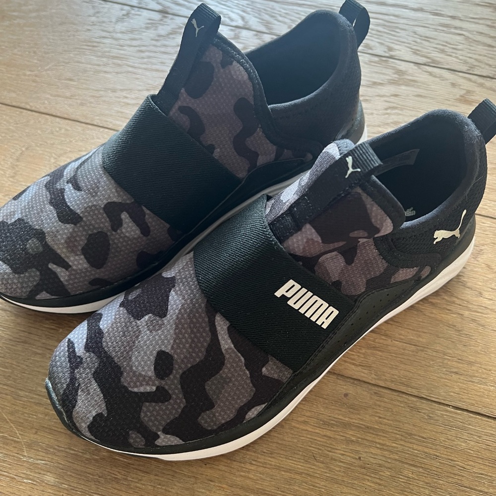 Puma slip on sneakers. Worn once. Great condition like new